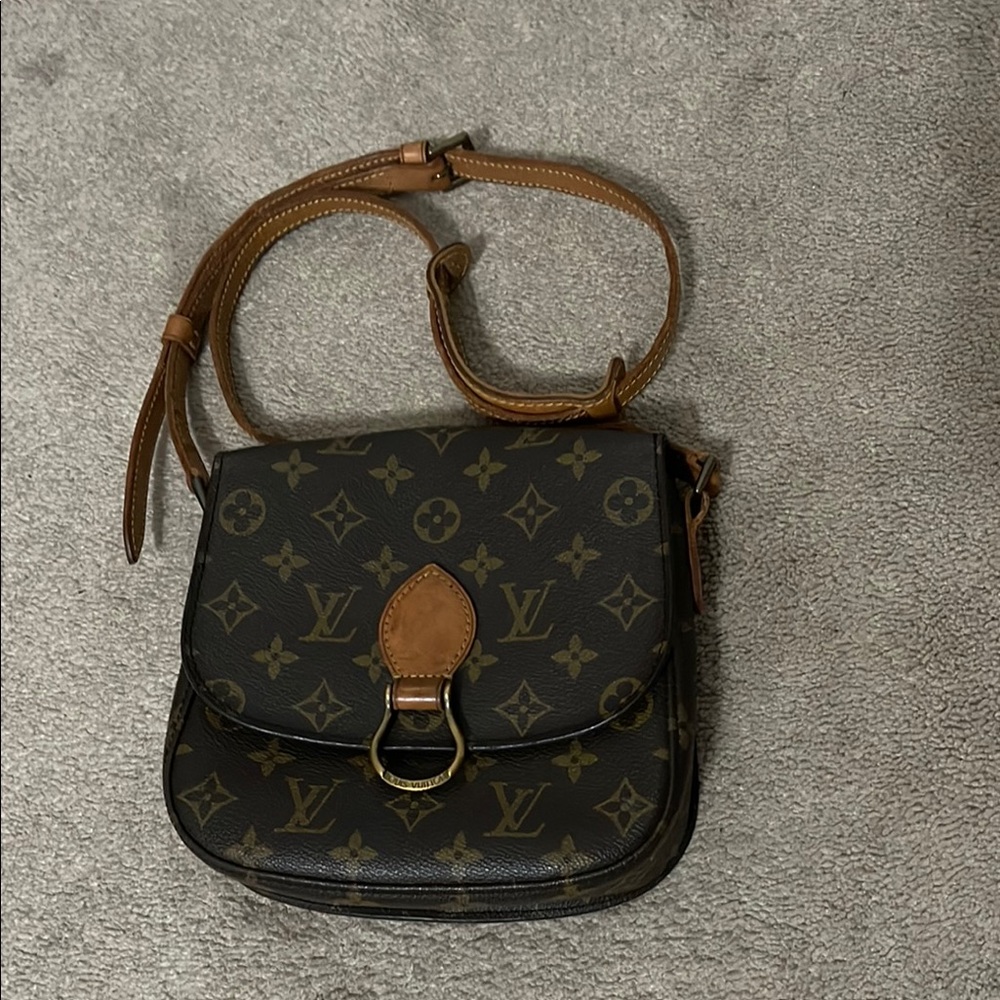 Louis Vuitton St. Cloud Crossbody Bag with Monogram Design and Flap Closure